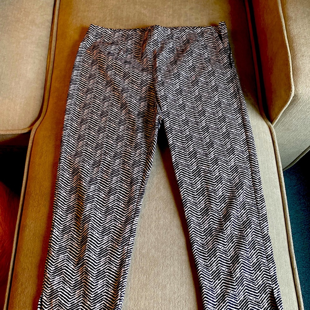 Size .5 Chicos women Capri pants with side zipper. Black and white